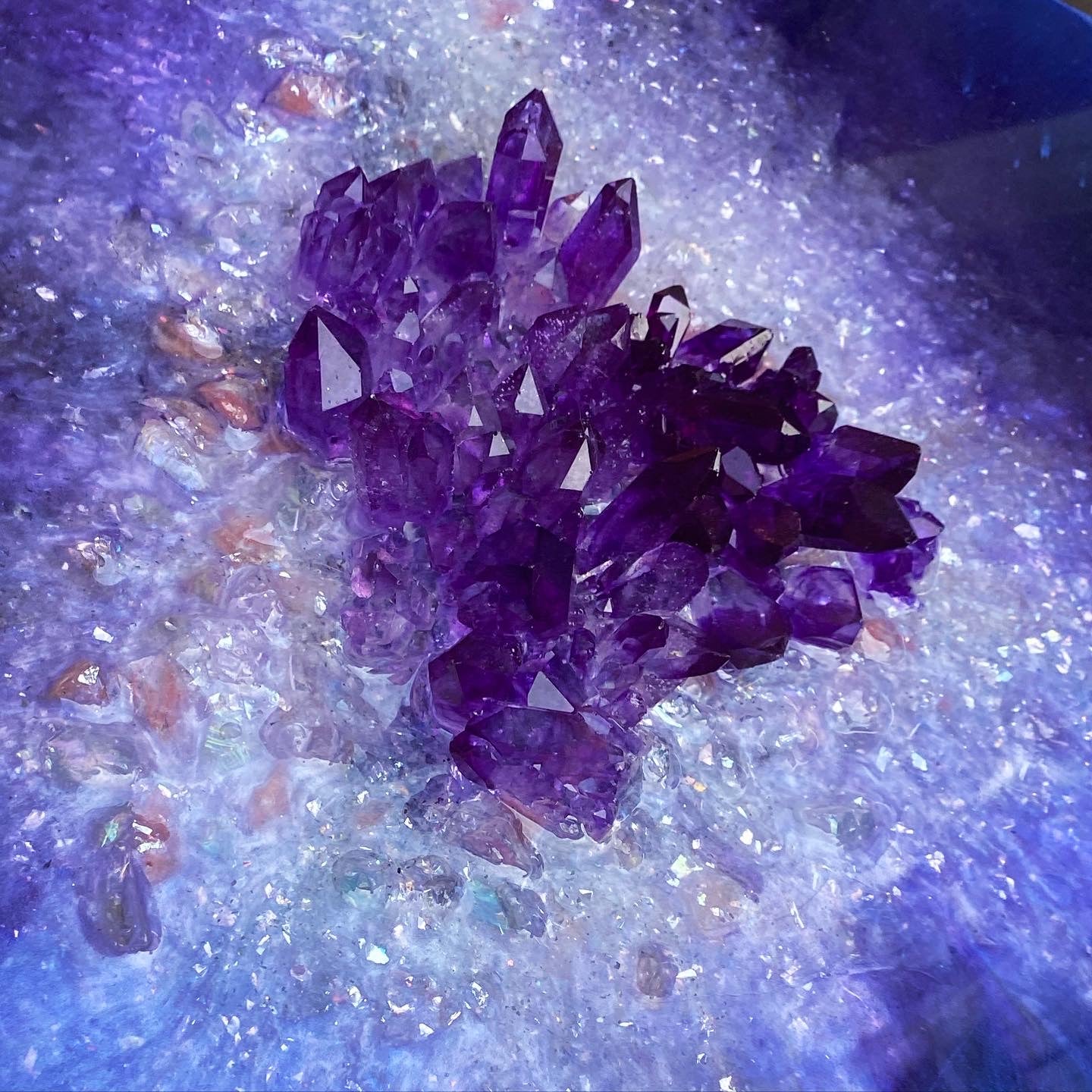 Purple amethyst light coffee table with handmade crystals.